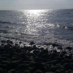 sun over bay of fundy water