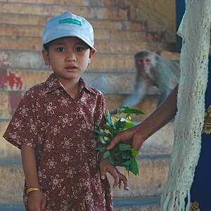 Little boy and his mother at the temple