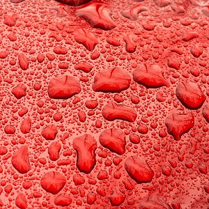 Rain Drops on a Red Car