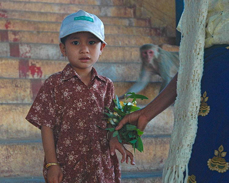 Little boy and his mother at the temple