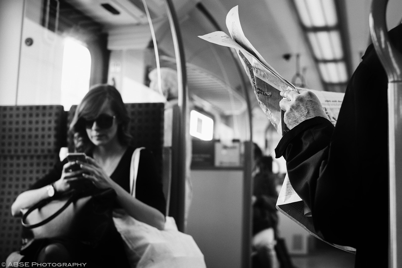 hands-newspaper-s-bahn-train-munich-germany-april-2017.jpg