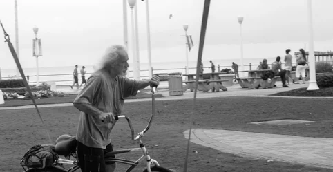 $Old Man Bicycle on Beach.webp