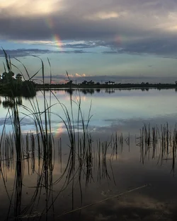 $Small double rainbow over Lake Rixen.webp