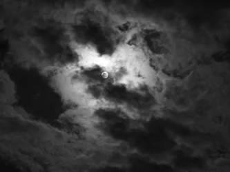 moon lit clouds .webp