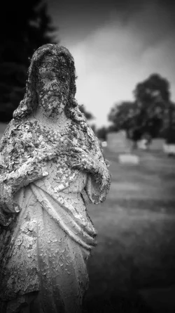 $CemeteryStatue.webp