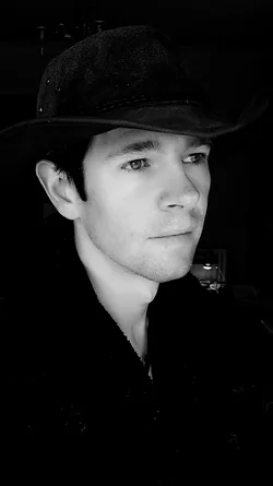 $Me, side portrait, black and white.webp