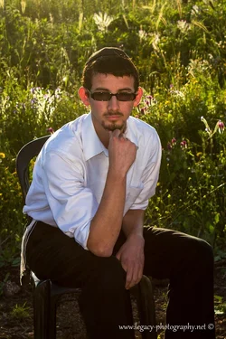 $Yisroel in a field - serious - 2 - 2x3 crop.webp