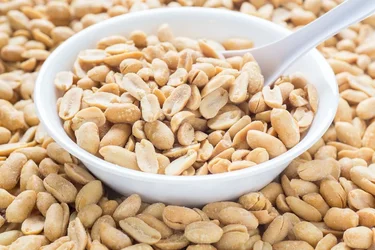 $Salted Peanuts in White Bowl with Spoon.webp