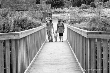 $Family walking on bridge from Monastic Settlement in Glendalough.webp