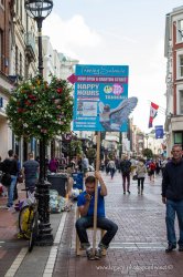 $Happily working - Sign holder in Dublin.jpg