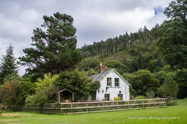 $House in Glendalough against mountan backdrop - from rear.webp