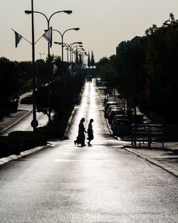 $RBS Ayalon street in the early morning - 2 women crossing silhouette.jpg