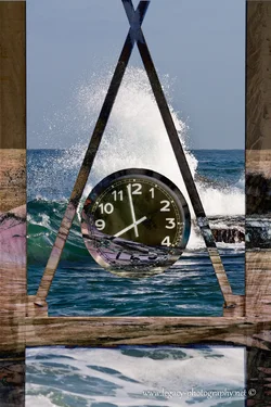 $Clock structure over Explosion of water over the rocks - Mediterranean.webp