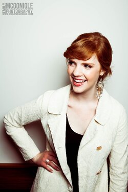 $laughing-red-hair-white-wall.jpg