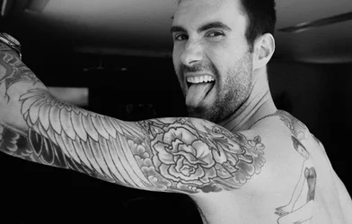 $adam-levine-flower-tattoo-design.webp $adam-levine-flower-tattoo-design.webp