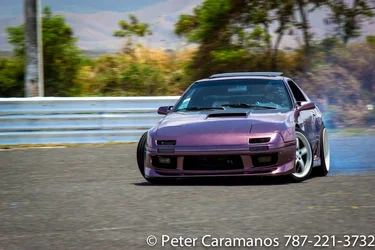 $drifting_mazda_rx7_at_the_track_by_caramanos2000-d7oo2e3.webp