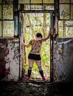 $a_woman_and_her_tattoos_by_caramanos2000-d7fduur.webp