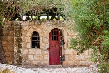 Old door and barred window.webp