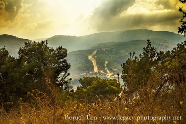 Road leading up a mountain - cinematic.webp