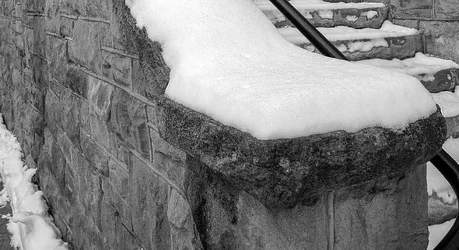 snow on church steps.webp