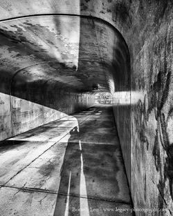 Shadows in  a sunlit tunnel - Full contrast - blue filter.webp