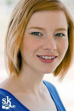$portrait_young_woman.webp
