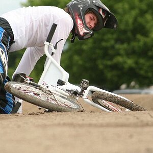 A rider loses his chain in a race,