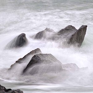 Waves washing over rocks