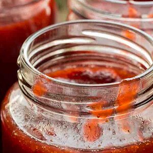 Strawberry jam in a jar macro