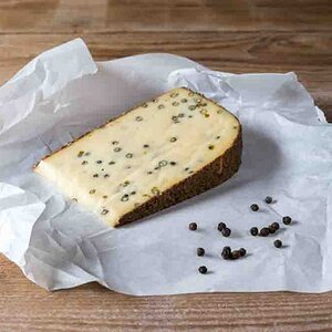 Pepper cheese on wooden table