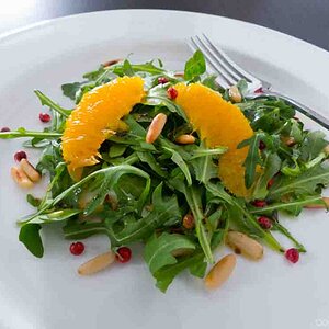Arugula salad with oranges and pine nuts