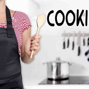 cooking cook holding wooden spoon background