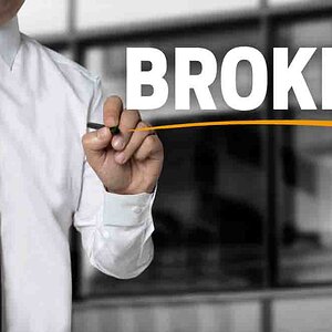 broker is written by businessman background concept