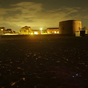 martello tower at night