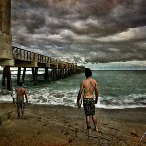 Juno Beach Surfers in the Storm