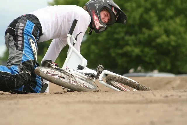 A rider loses his chain in a race,