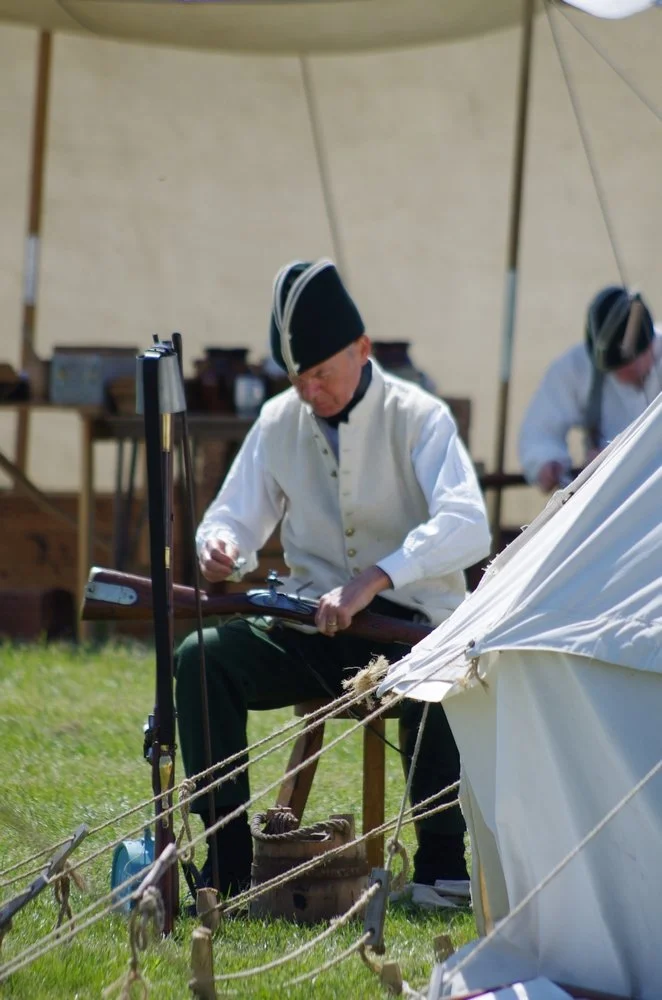 Cleaning a musket