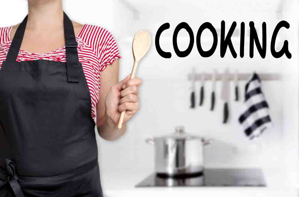 cooking cook holding wooden spoon background