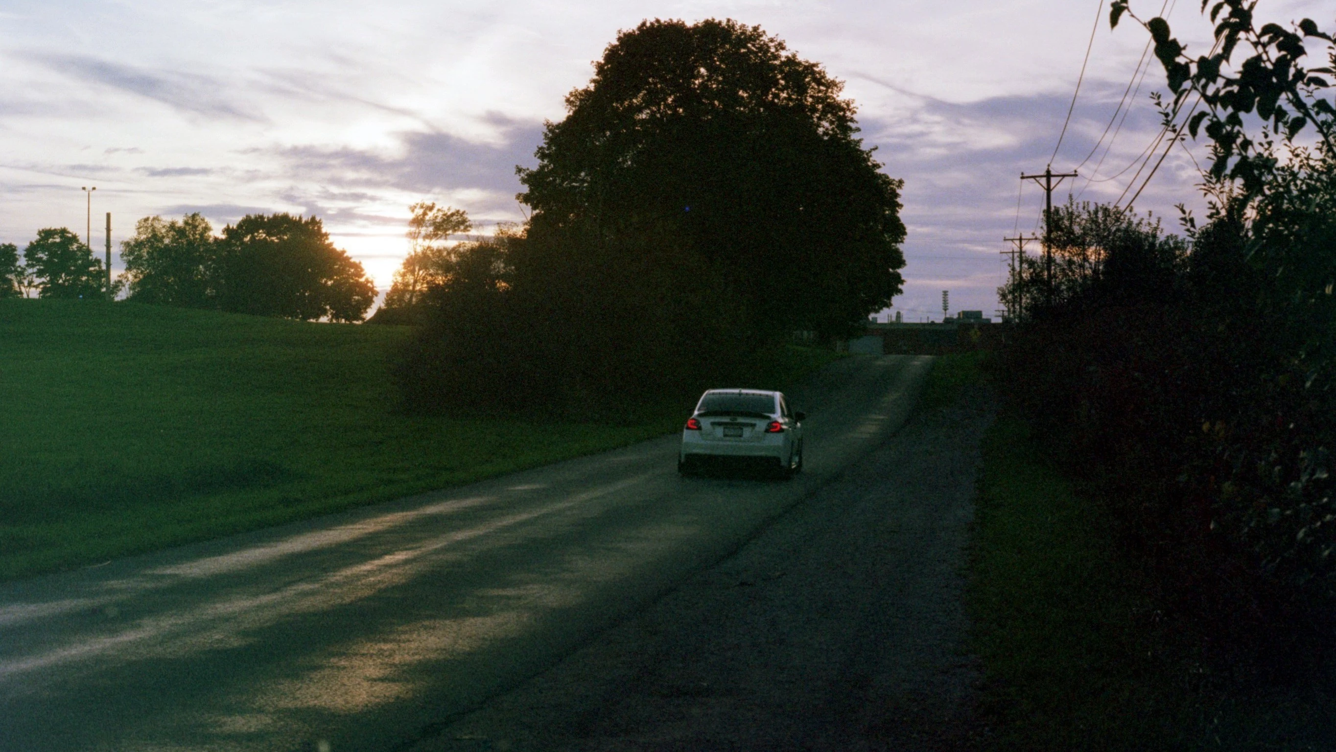 Driving Off Into the Sun Set