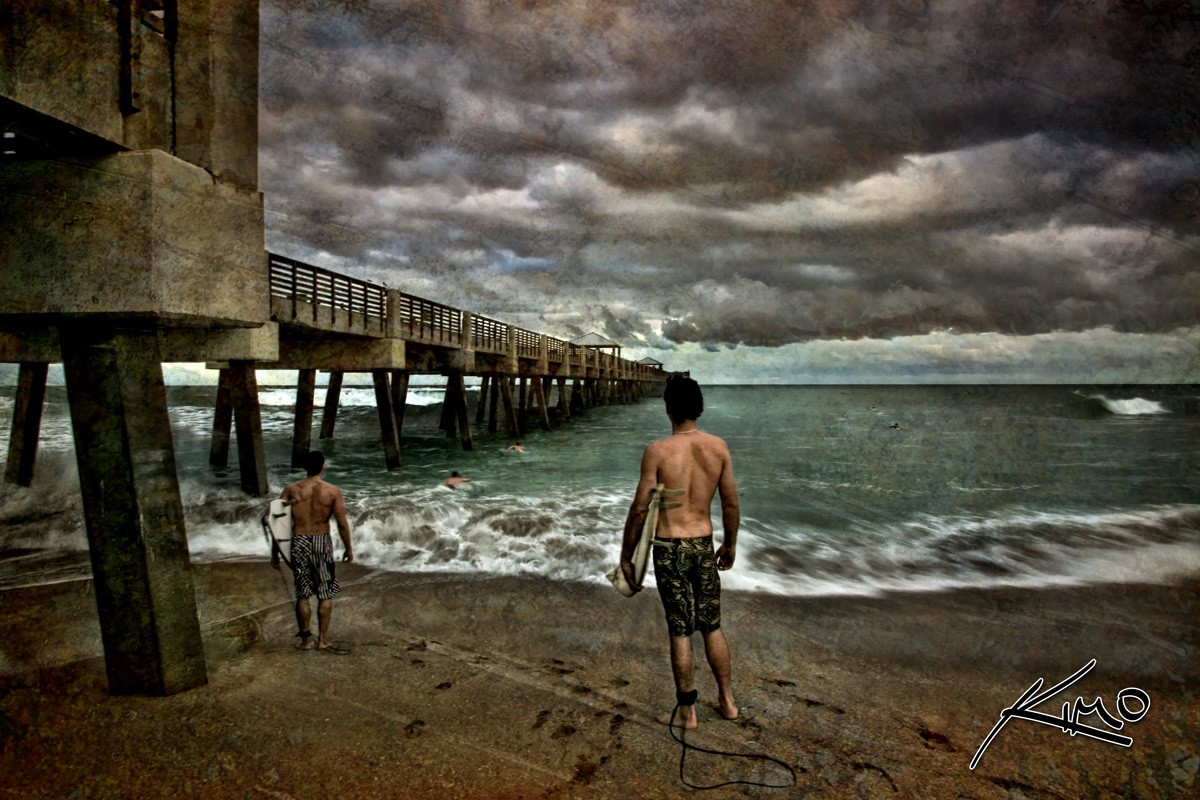 Juno Beach Surfers in the Storm