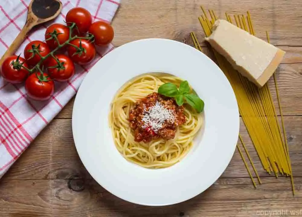 Spaghetti with Bolognese Sauce Parmesan and basil