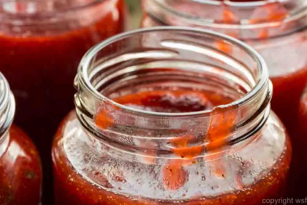 Strawberry jam in a jar macro