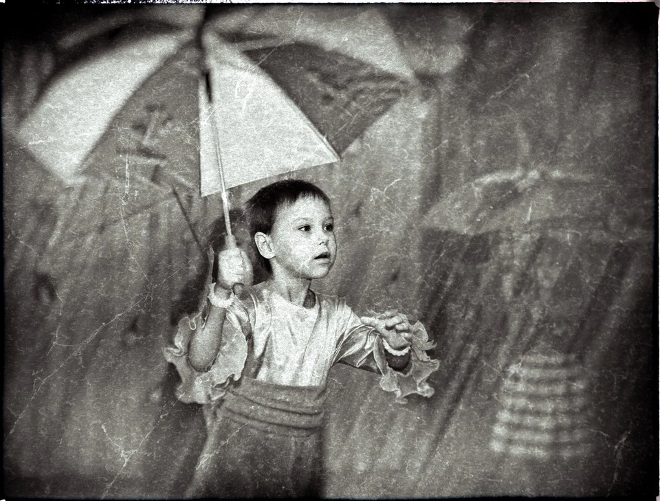 The girl with an umbrella