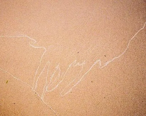 writing on the sand