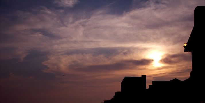 buildingsillhouettewithsunset.jpg