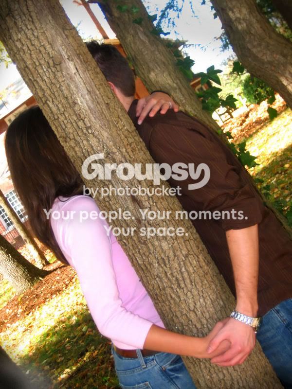 ChrisandChristinabehindthetree2smal.jpg