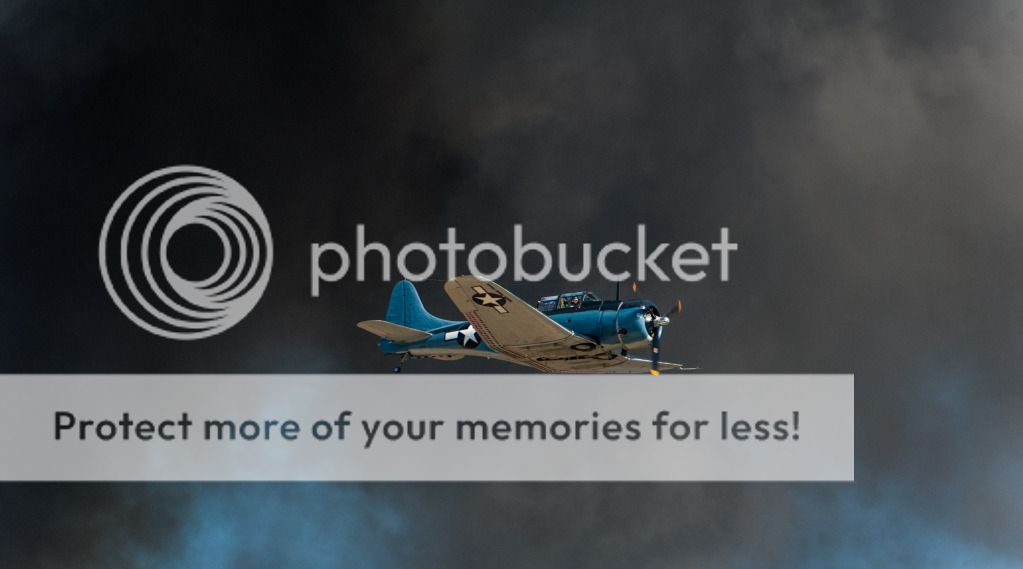 DouglasDauntlessFlyinginSmoke.jpg