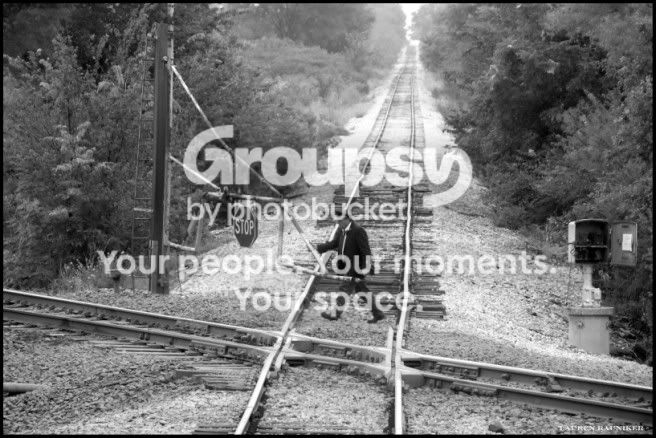 Unlockingthegateatthetrainintersect.jpg
