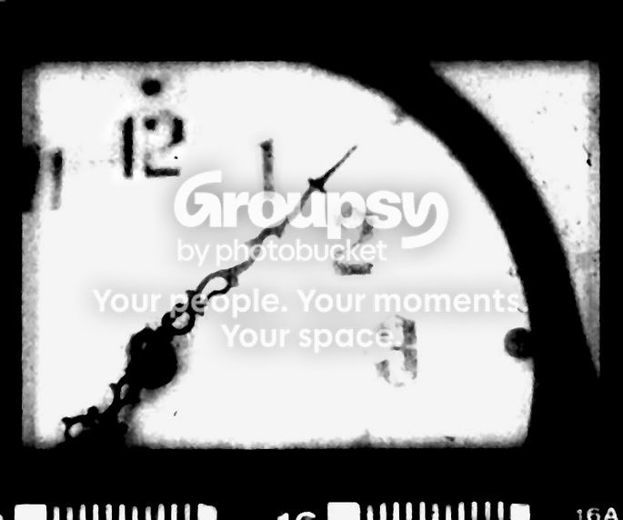 clockde-neg.jpg