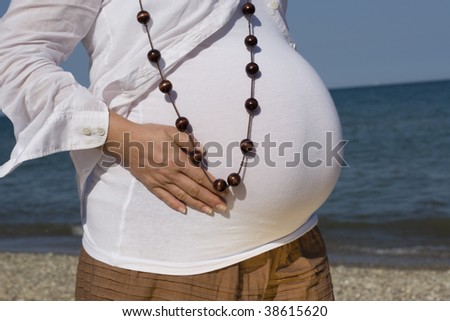 stock-photo--month-pregnant-belly-38615620.jpg